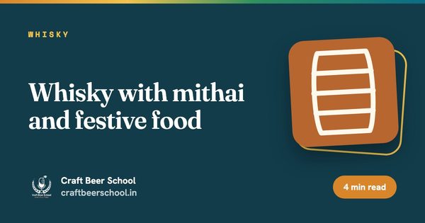 Whisky with mithai and festive food